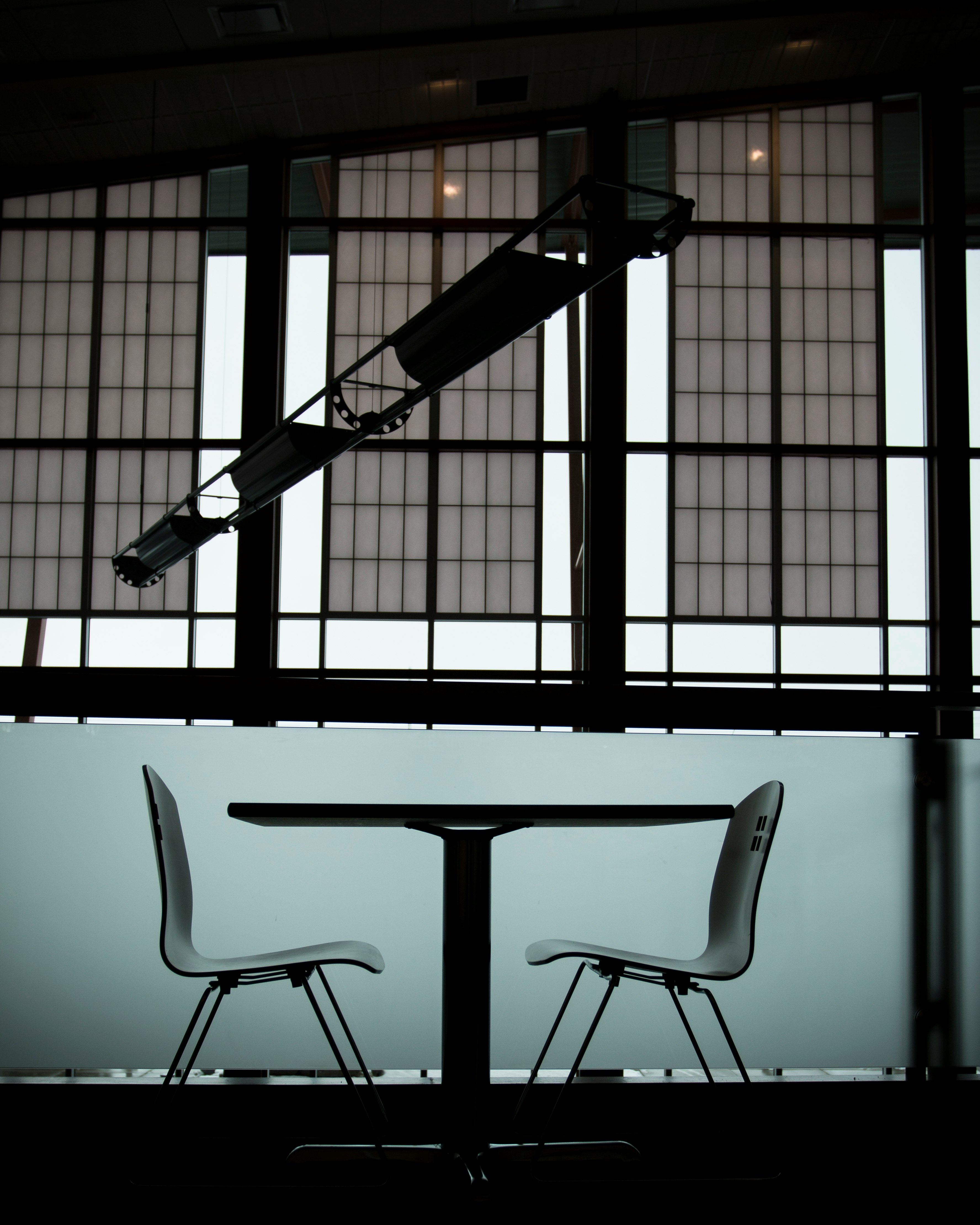 table between two chairs